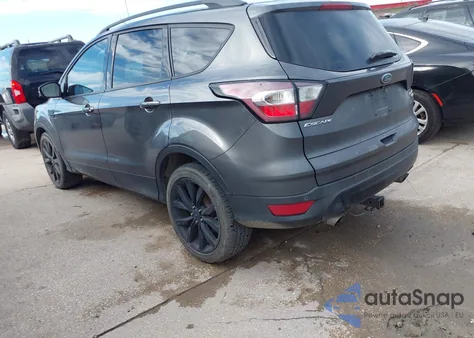 2017 Ford Escape Titanium z USA, uszkodzony, nr VIN 1FMCU0J95HUC34066